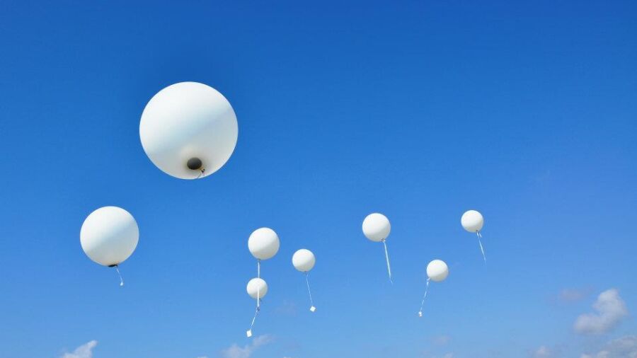 Asverstrooiing met heliumballonnen